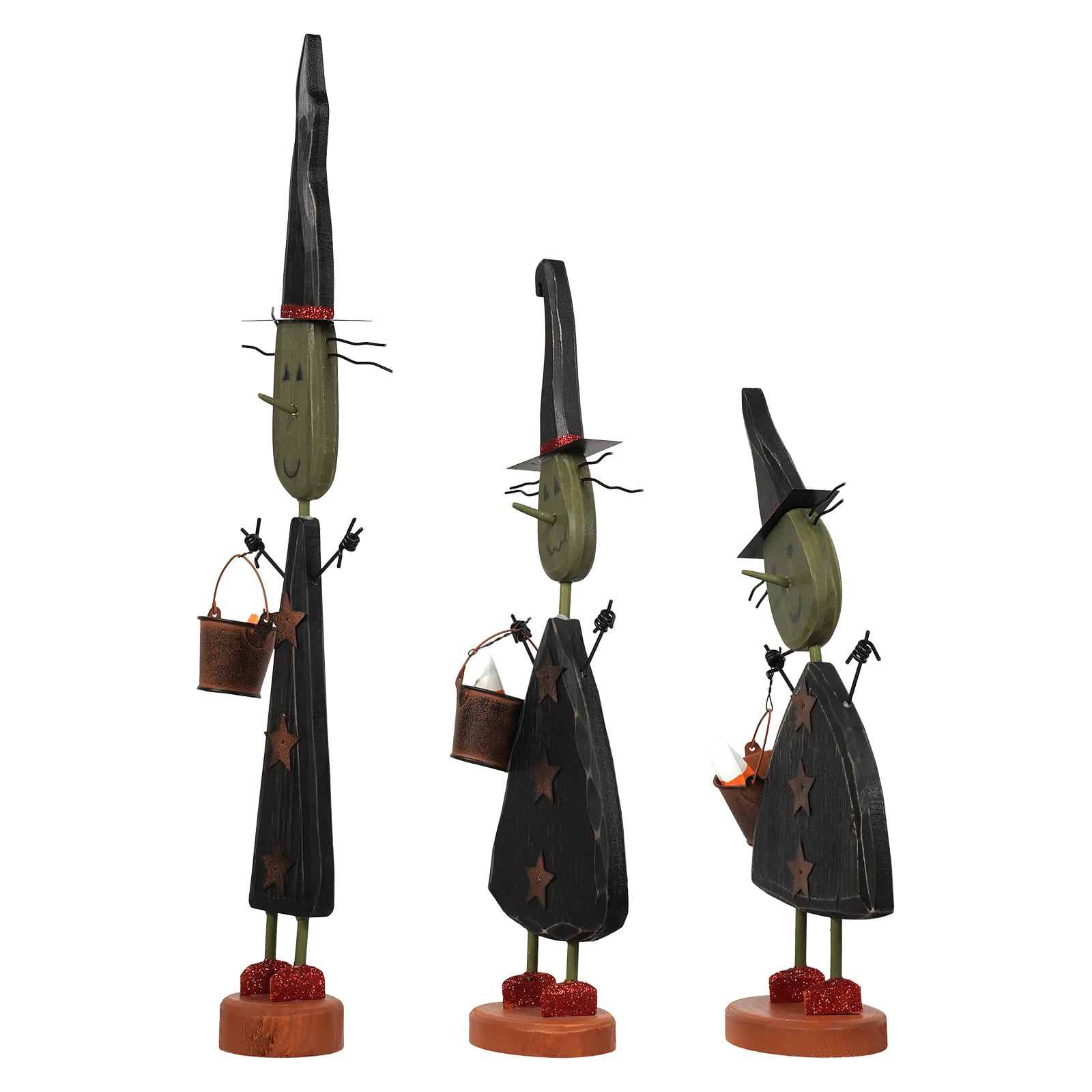 Three whimsical witch figurines with green faces and star cutout robes on glittery red bases witches three gang by dan dipaolo design american folk art