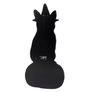 Black silhouette of a cat sitting on a rounded base.