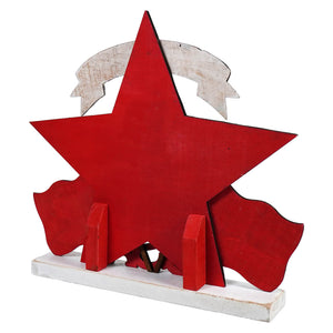Red wooden star decoration with a banner and flag elements.