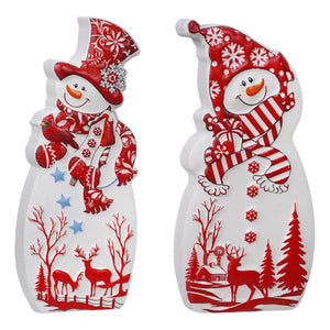 Two festive red and white wood engraved jolly snowman standing blocks with detailed holiday patterns and striped scarves