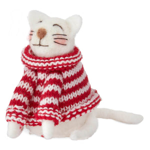 A white wool holiday cat figurine wearing a red and white striped knitted scarf for christmas tabletop decor