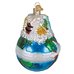 Glass globe world traveler ornament with painted continents blue oceans snow peaks and a red fox figurine perfect as a world peace ornament