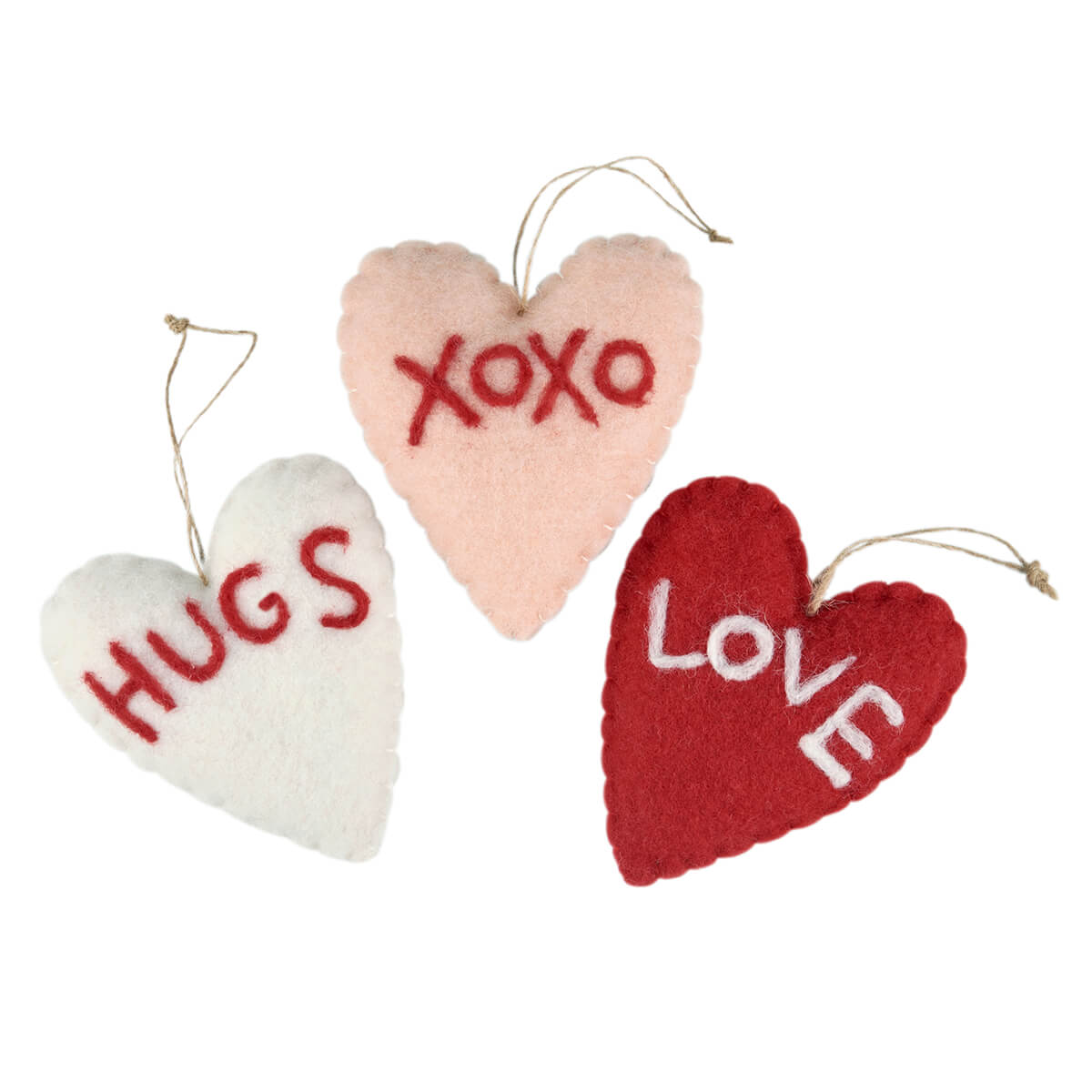 Three heart-shaped ornaments with ’HUGS,’ ’XOXO,’ and ’LOVE’ written on them in red lettering.