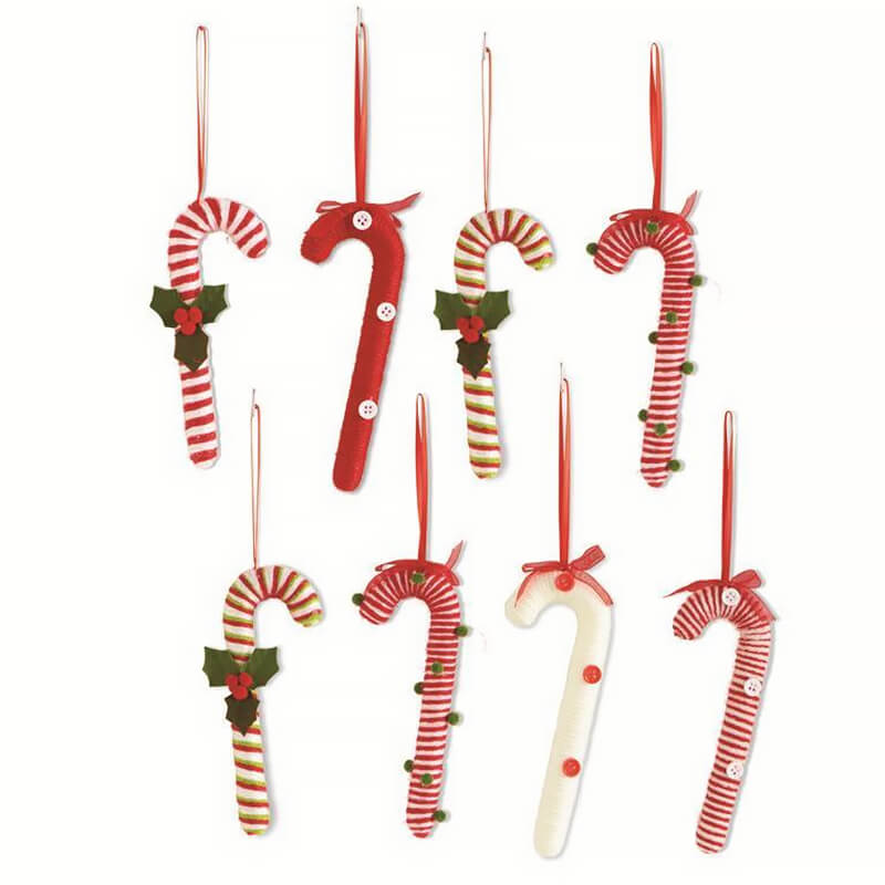 Festive candy cane ornaments in red and white stripes with decorative accents.