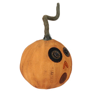 Orange fabric rustic pumpkin with stitched face and twisted green stem from yellow canvas rustic collection
