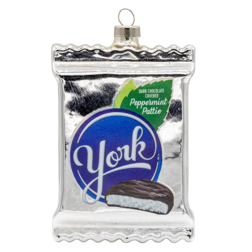 Silver glass york peppermint pattie ornament shaped like candy wrapper with blue logo, an official licensed ornament