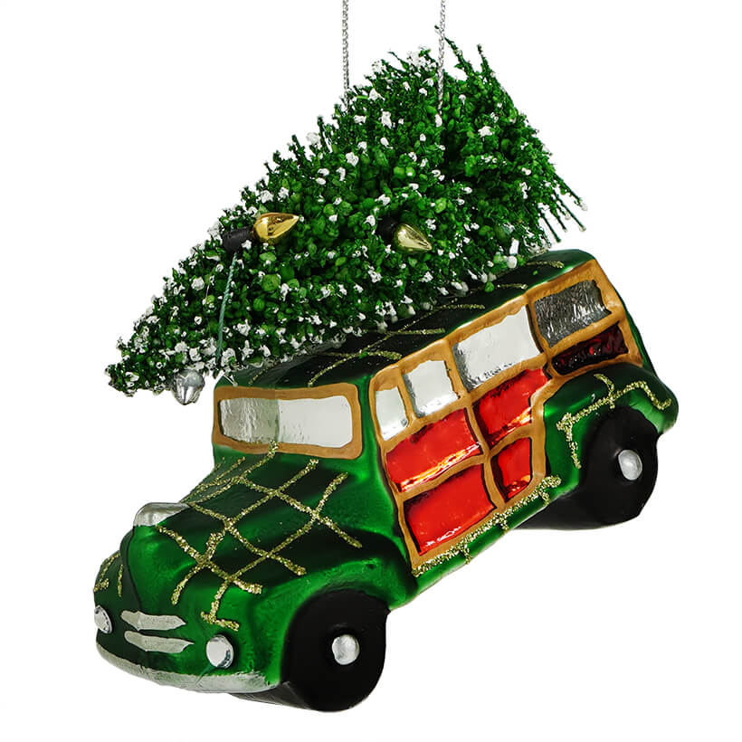 Green Automobile with Tree Ornament