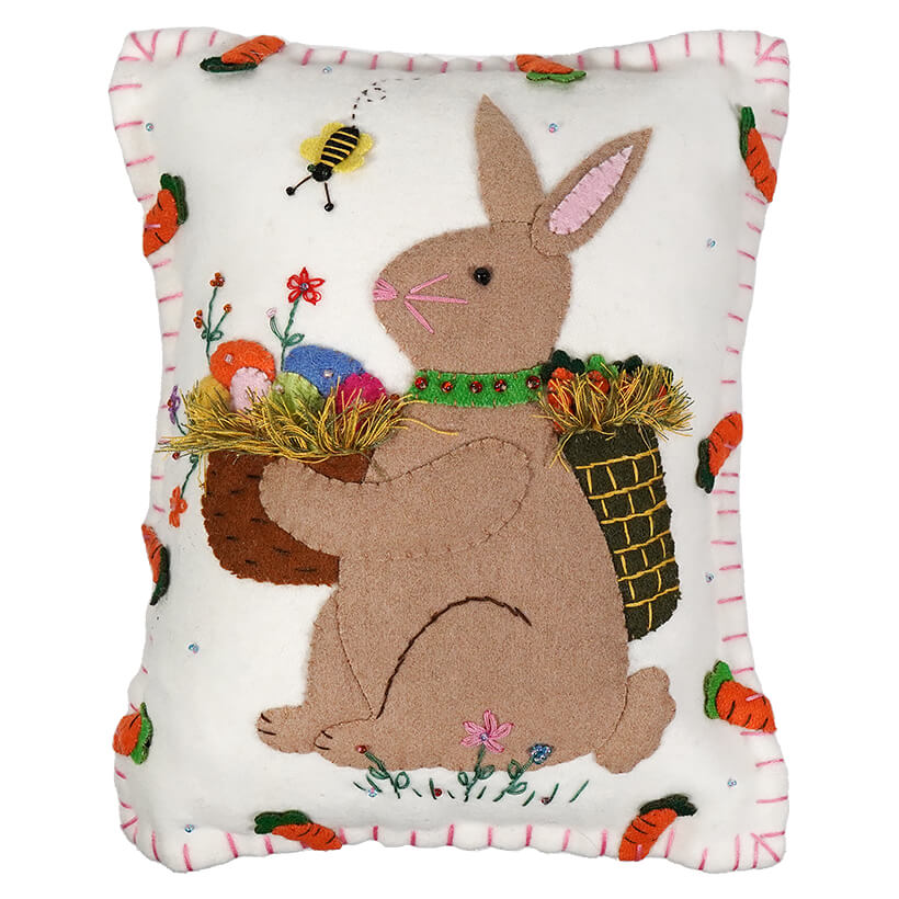 White Pillow With Brown Rabbit Holding Carrot