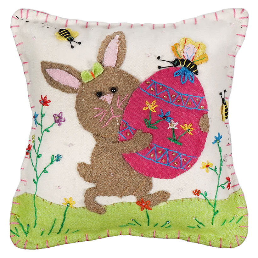 White Pillow With Brown Rabbit Holding Egg