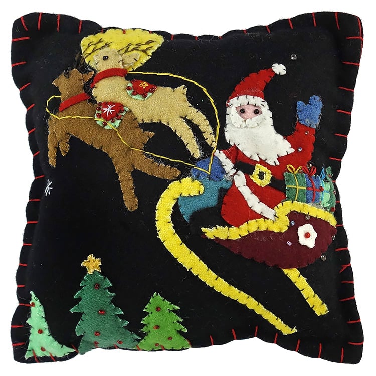 Santa Flying over the Trees in Sleigh Pillow